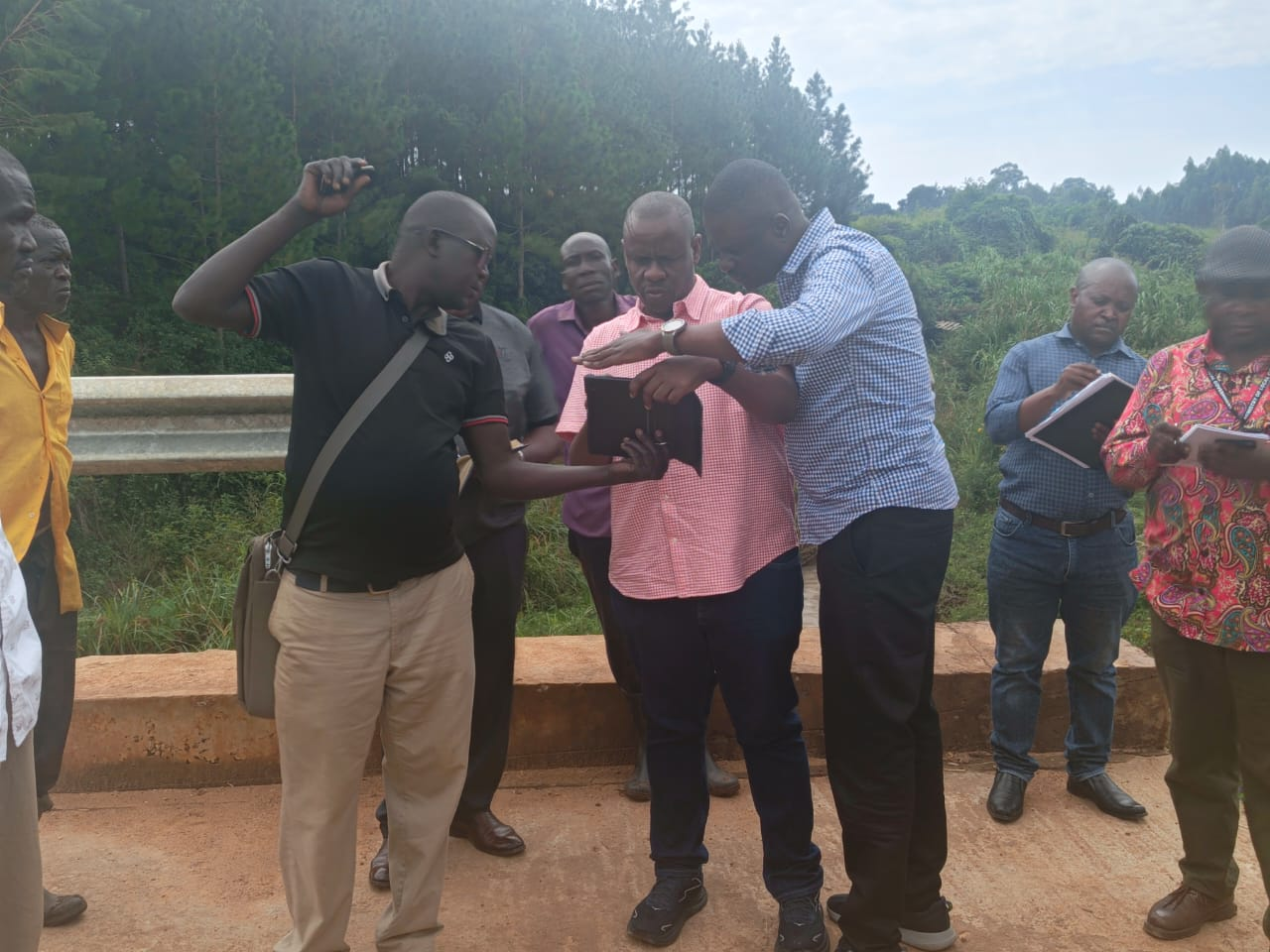 Minister Balaam and the National Coordinator for PDM, Galabuzi Ssozi Inspect Aru Bridge and 4km Road Project in Maracha District
