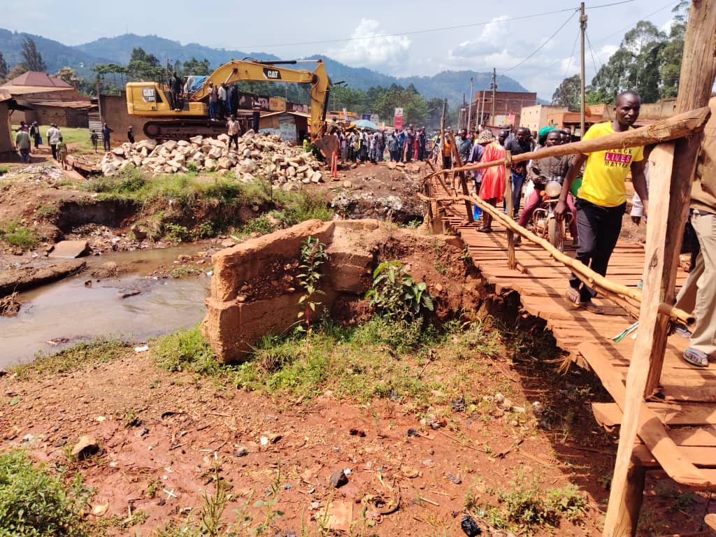 Minister Balaam Inspects Collapsed Bridge Linking Bududa Town to Hospital on Anti-Corruption Tour