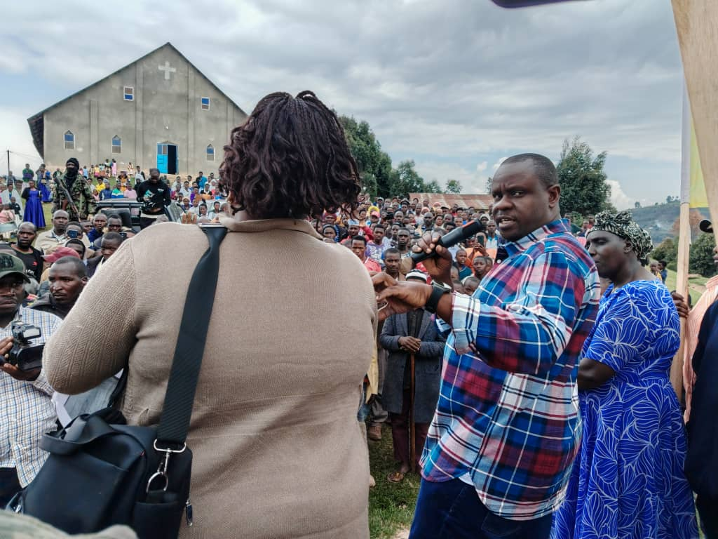 HON. BALAAM VISITS KIFUMBA MODEL VILLAGE IN MUHINDURA PARISH OVER PLAYING FIELD GRABBING AND CLASSROOM FRAUD AT GIFUMBA PRIMARY SCHOOL
